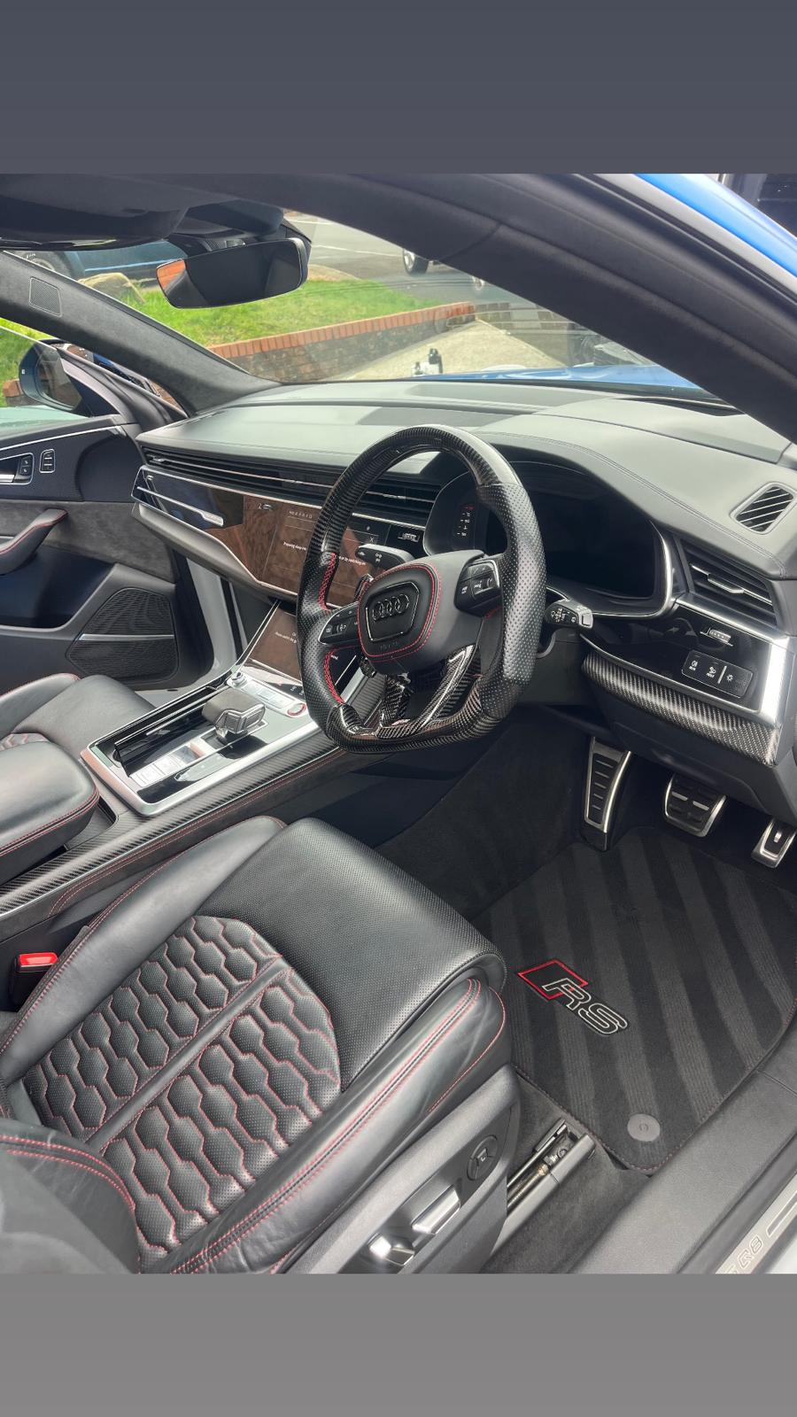 Audi RS leather cabin after a full interior deep clean, steamed, shampooed and conditioned with red honeycomb stitching restored